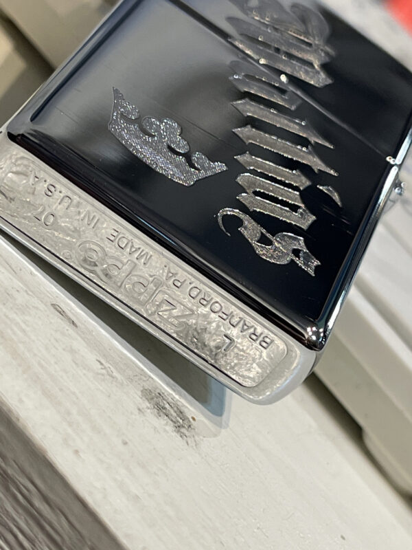 Zippo "high Polish" inkl. text GRAVYR
